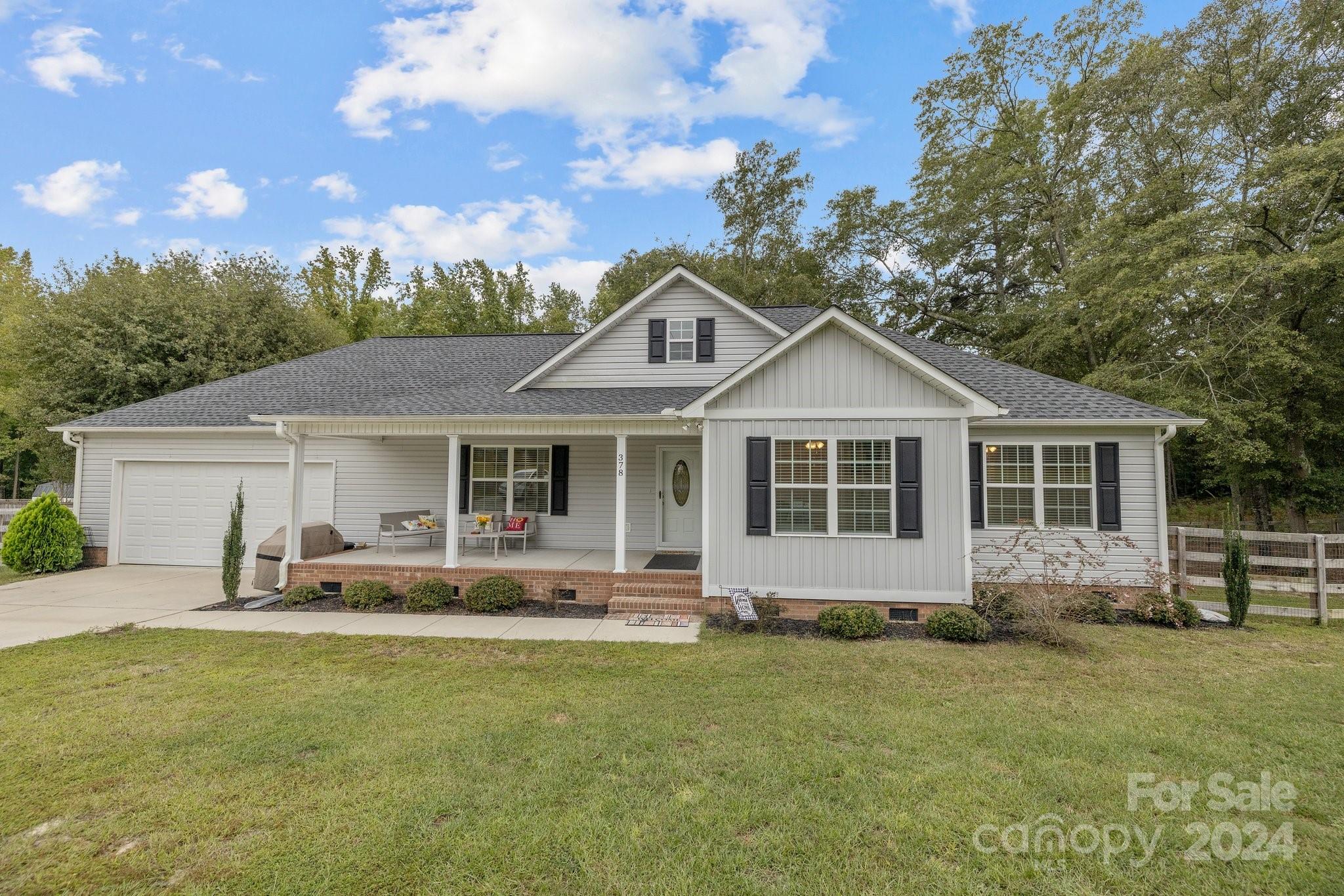 378 Boyd Faile Road Heath Springs, SC 29058 - Photo 1 of 28 a front view of house with yard and green space