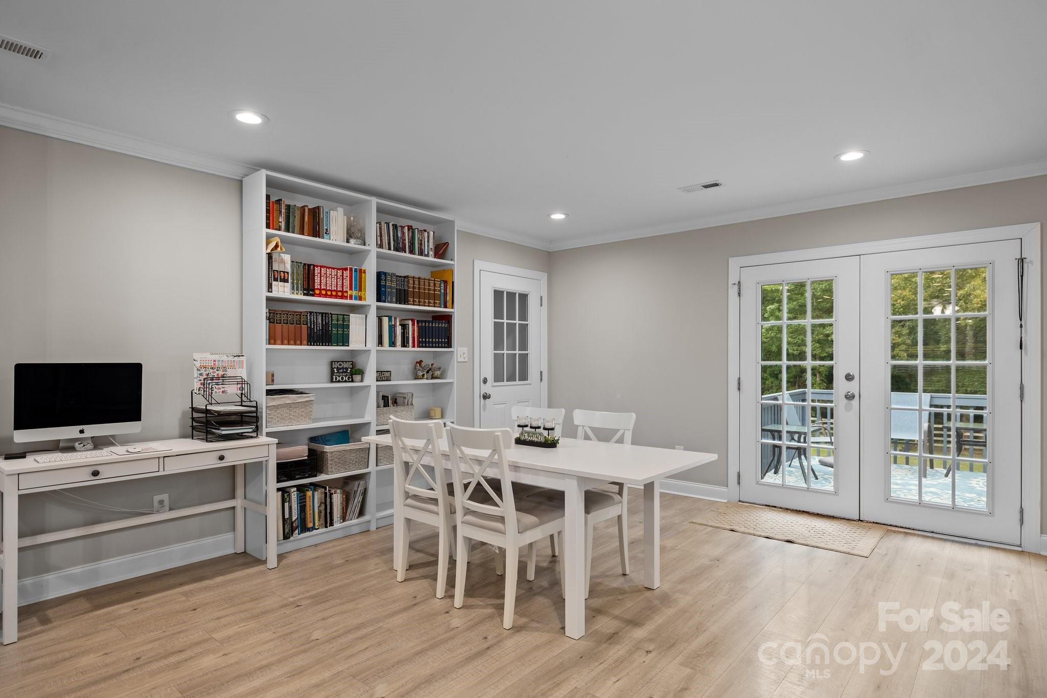 378 Boyd Faile Road Heath Springs, SC 29058 - Photo 14 of 28 a view of a dining room with furniture and wooden floor