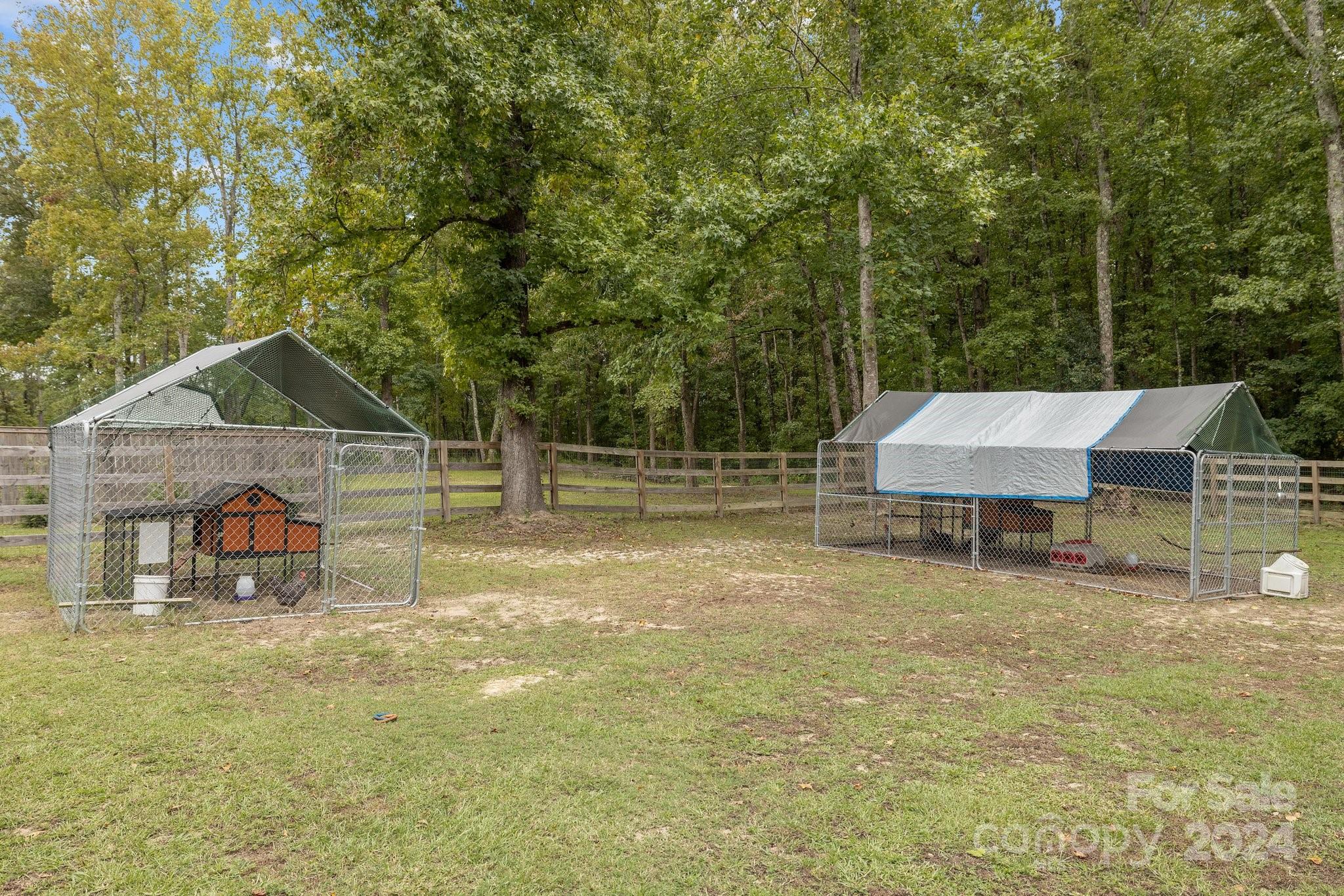 378 Boyd Faile Road Heath Springs, SC 29058 - Photo 23 of 28 a view of a house with pool and a yard