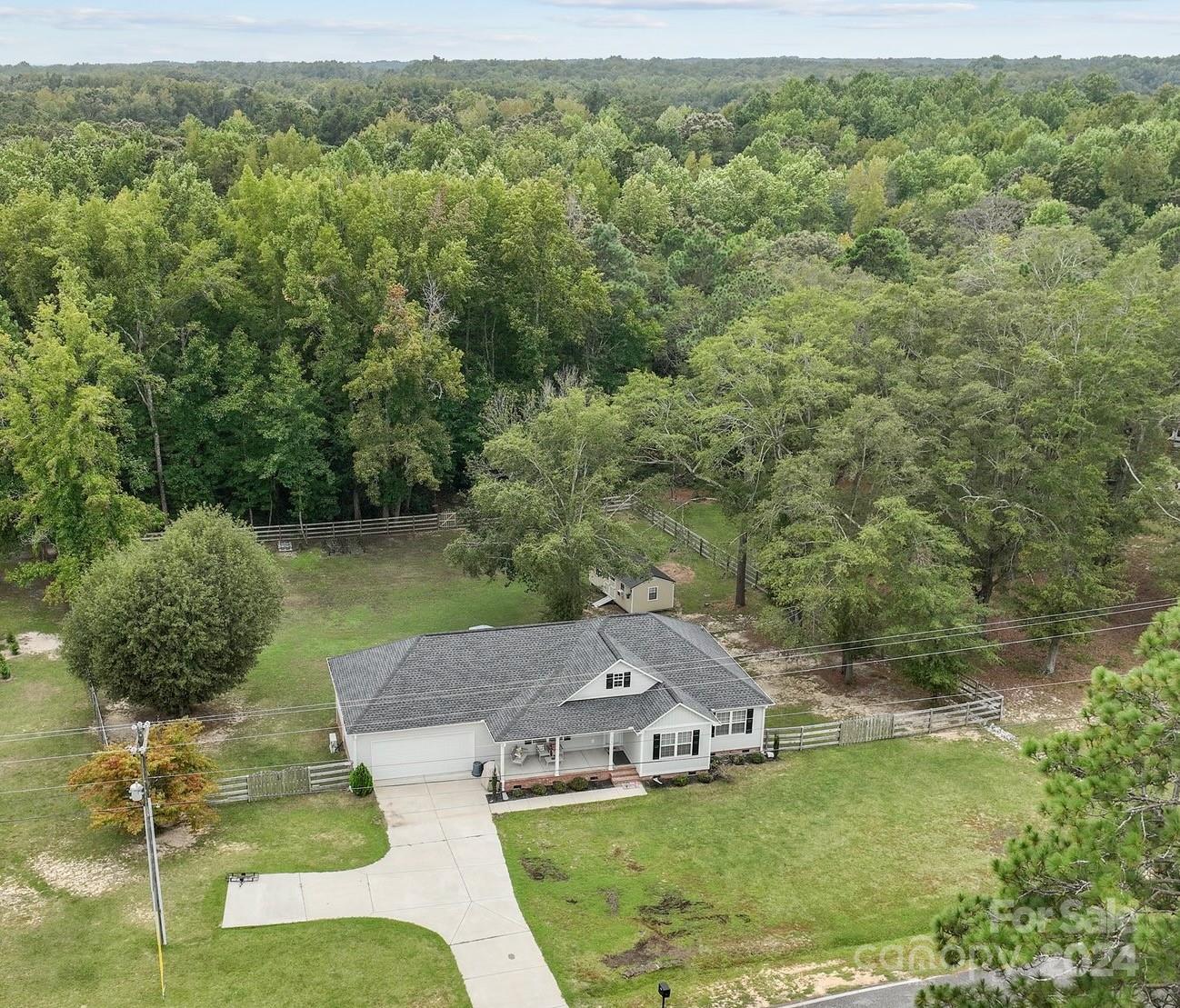 378 Boyd Faile Road Heath Springs, SC 29058 - Photo 27 of 28 a view of a house with a yard