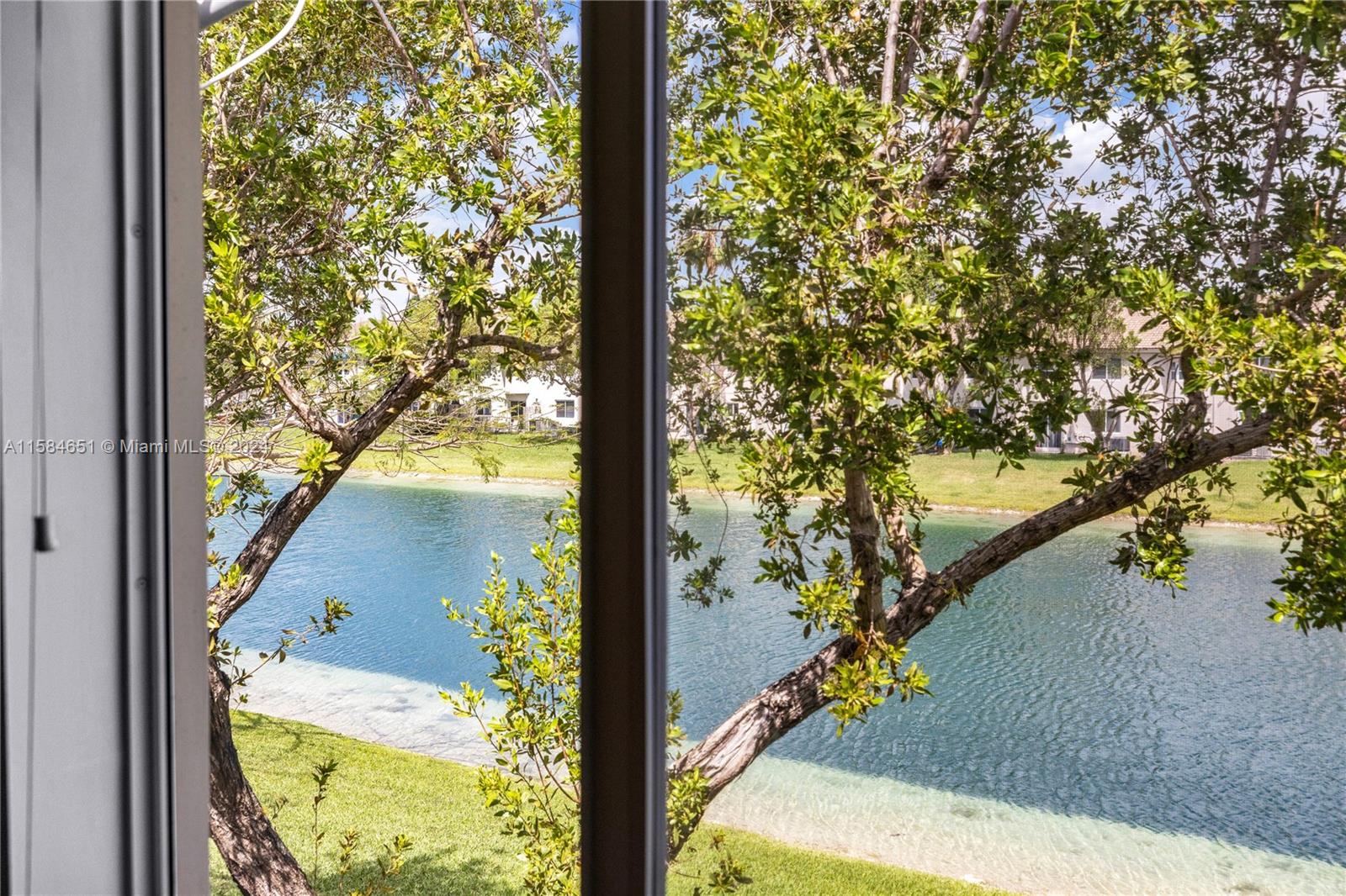 a view of a lake from a window
