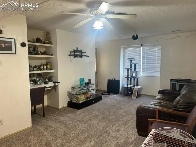 a living room with furniture and decor