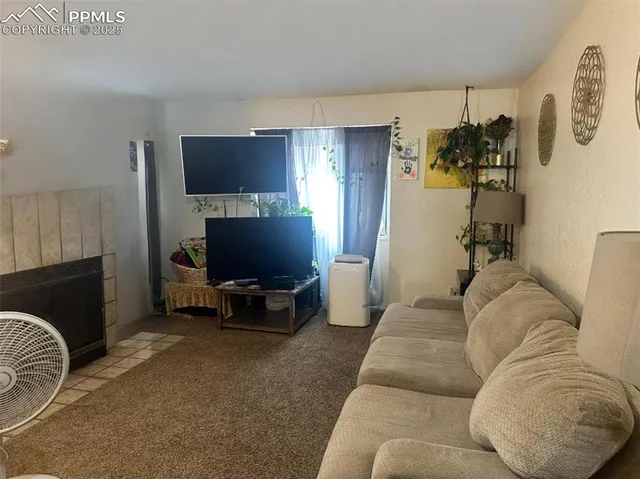 a living room with a couch and a table