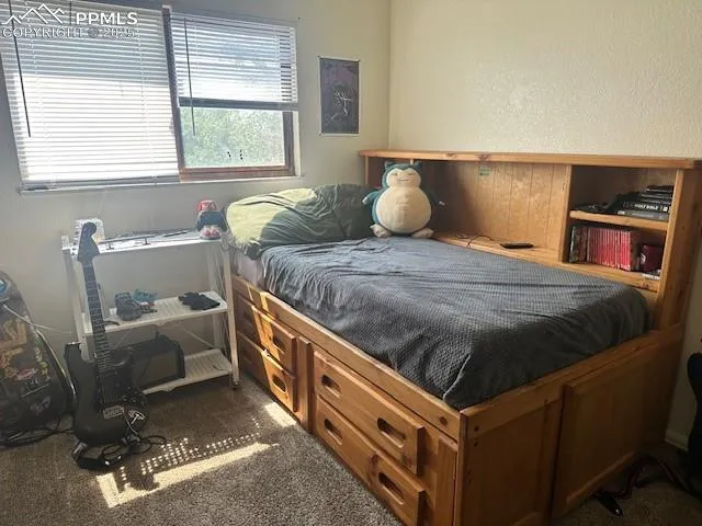 a view of a closet with storage