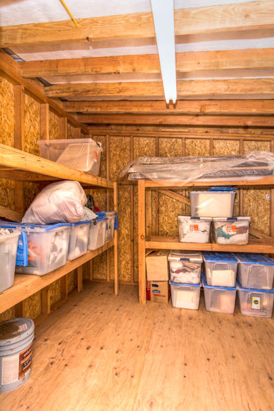 56264 Black Duck Road Bend, OR 97707 - Photo 19 of 31 The storage room has built in shelves. Great for storage of yard tools and patio furniture. Or insulate it and use as a workshop.