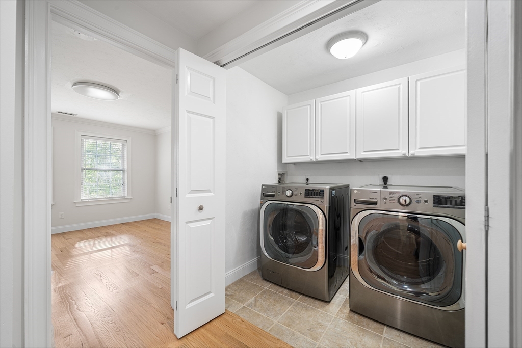 215 Rangeway Road, Unit 31 Billerica, MA 01862 - Photo 28 of 40 a view of a kitchen with washer and dryer