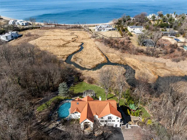 front view of a house with a garden