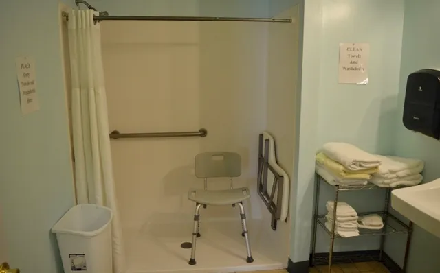 a kitchen with a sink stove and refrigerator