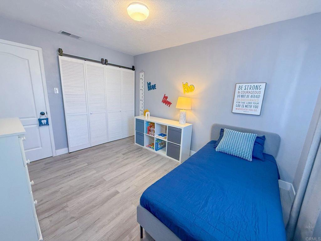 3237 Warley Road Hemet, CA 92545 - Photo 32 of 43 a bed room with a bed