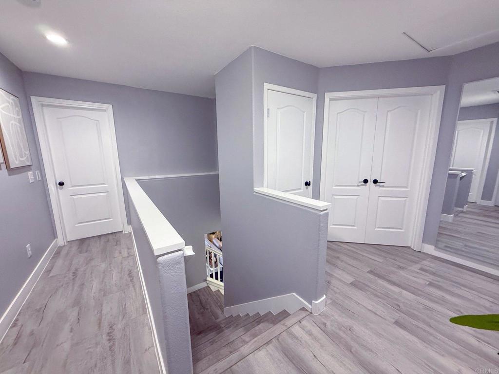 3237 Warley Road Hemet, CA 92545 - Photo 33 of 43 wooden floor in an empty room with a window