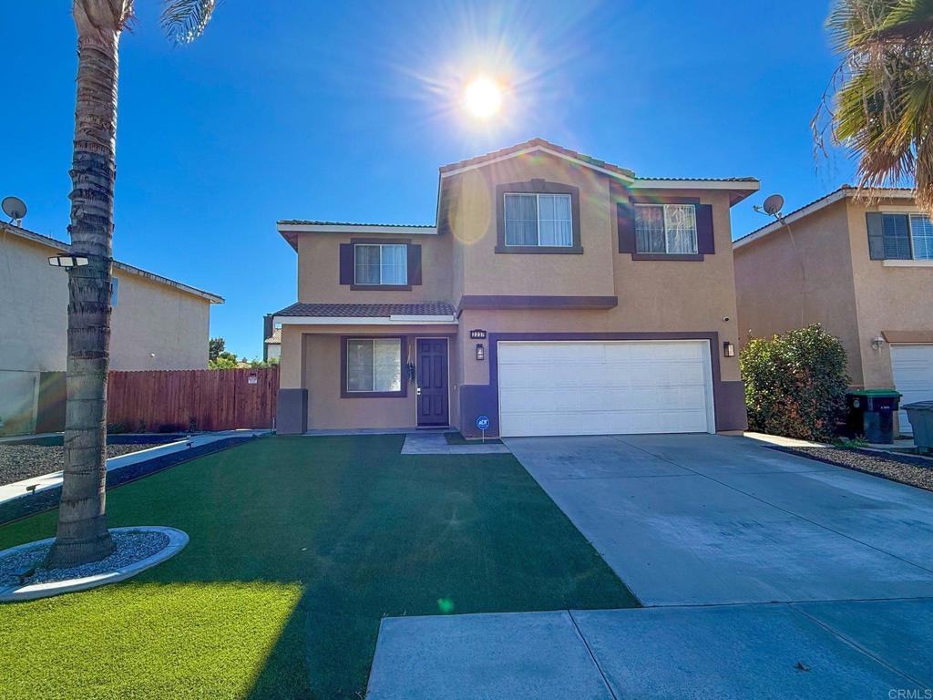 3237 Warley Road Hemet, CA 92545 - Photo 4 of 43 a front view of a house with a yard
