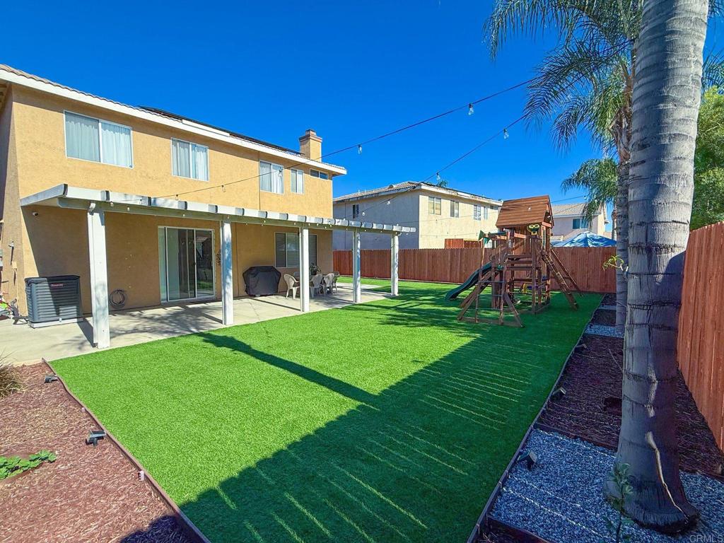 3237 Warley Road Hemet, CA 92545 - Photo 42 of 43 a view of a house with a yard porch and sitting area