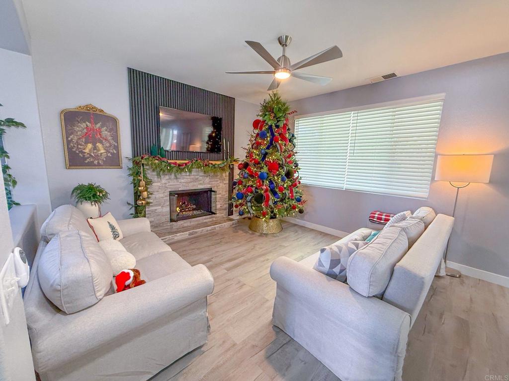 3237 Warley Road Hemet, CA 92545 - Photo 6 of 43 a living room with furniture and a fireplace