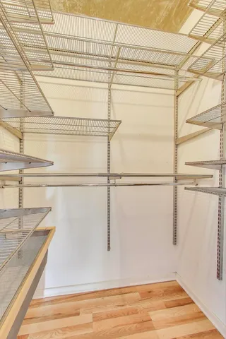 a bathroom with a sink a shower and a mirror