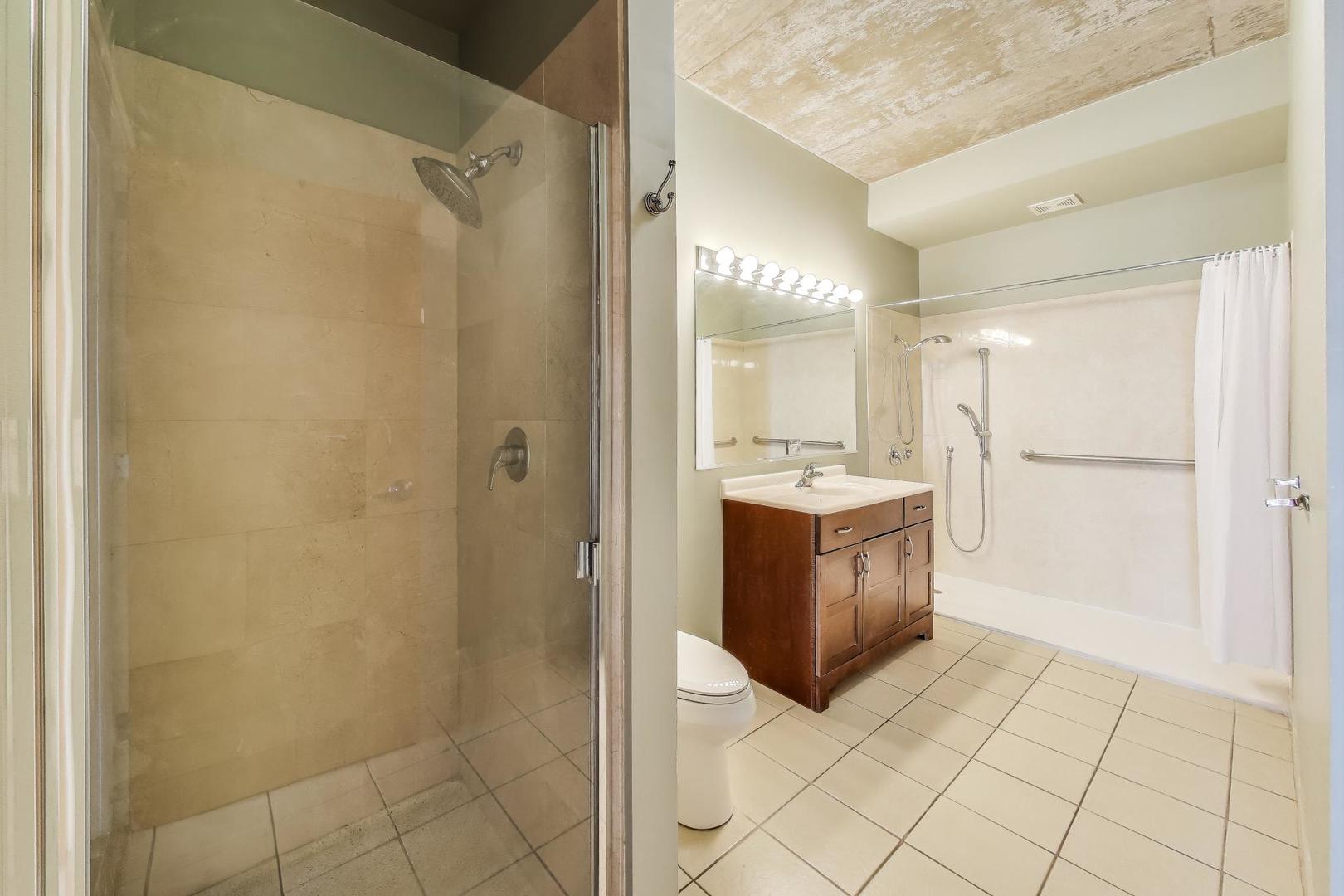 321 South Sangamon Street, Unit 605 Chicago, IL 60607 - Photo 23 of 36 a bathroom with a sink a toilet and shower