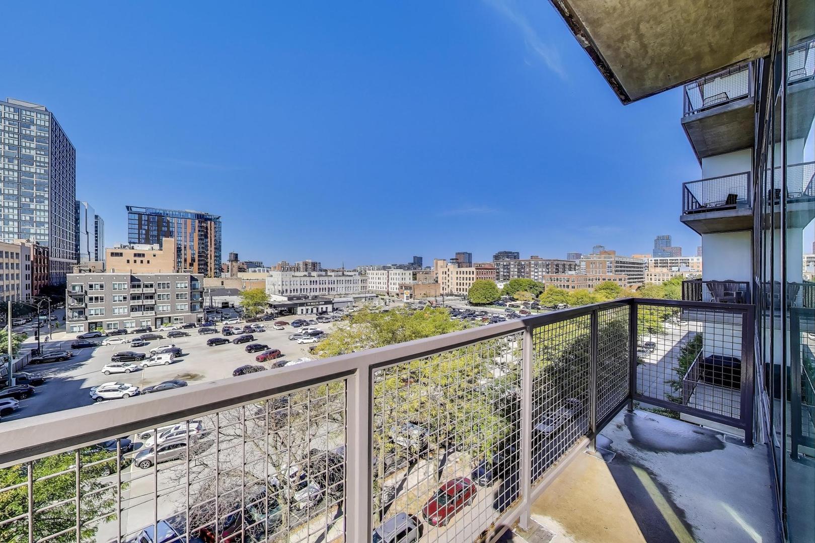 321 South Sangamon Street, Unit 605 Chicago, IL 60607 - Photo 30 of 36 a view of a balcony with chairs