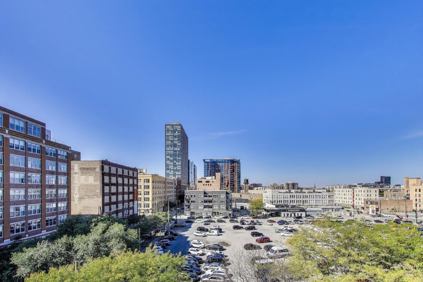 321 South Sangamon Street, Unit 605 Chicago, IL 60607 - Photo 31 of 36 a view of a city with tall buildings