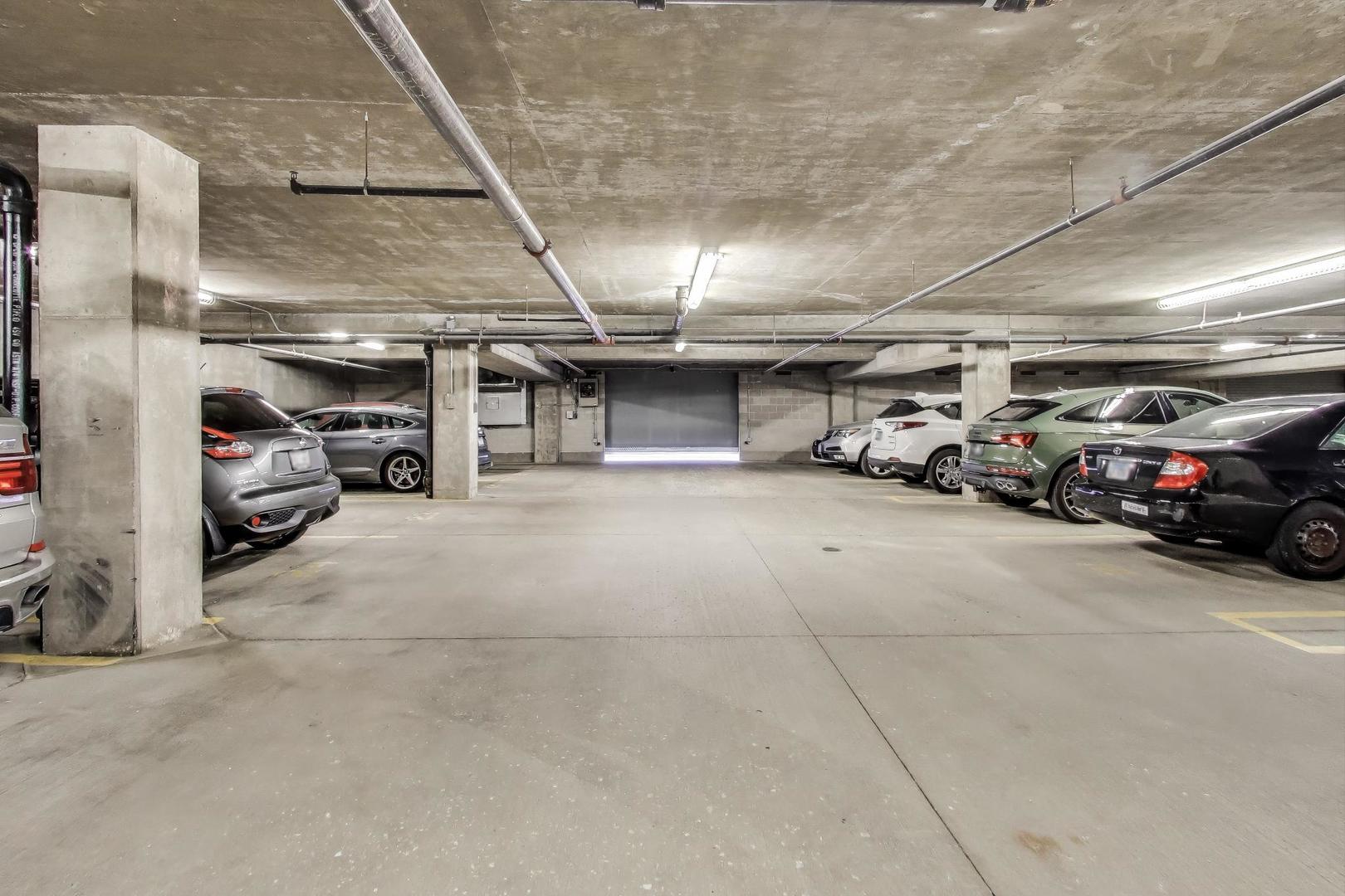 321 South Sangamon Street, Unit 605 Chicago, IL 60607 - Photo 34 of 36 a view of parking garage with cars parked