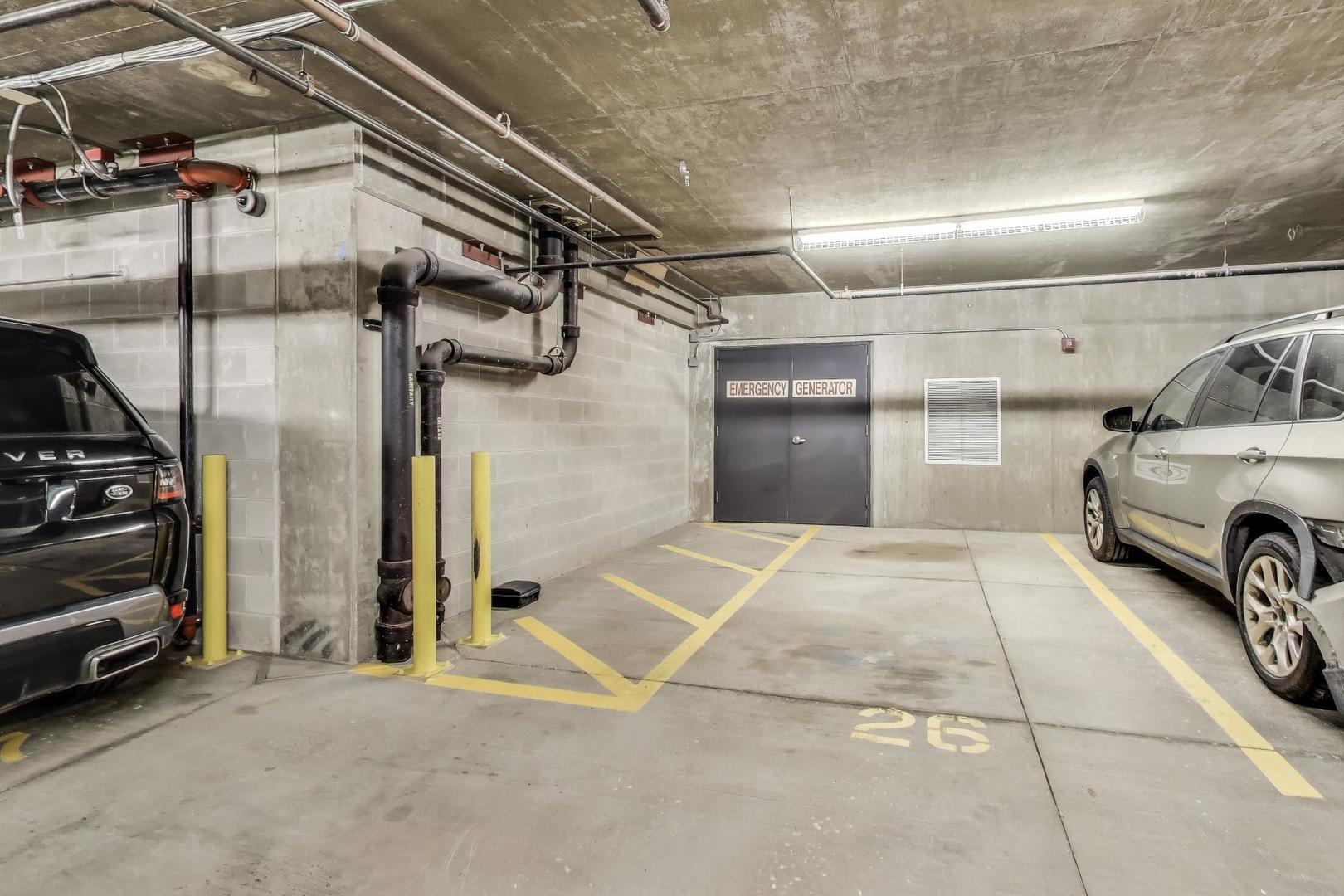 321 South Sangamon Street, Unit 605 Chicago, IL 60607 - Photo 35 of 36 a view of parking garage with cars