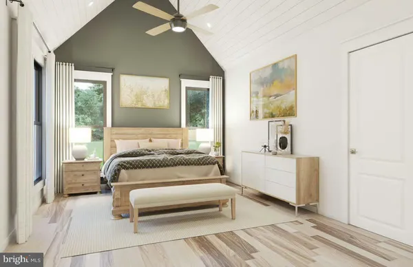 a bedroom with furniture and windows