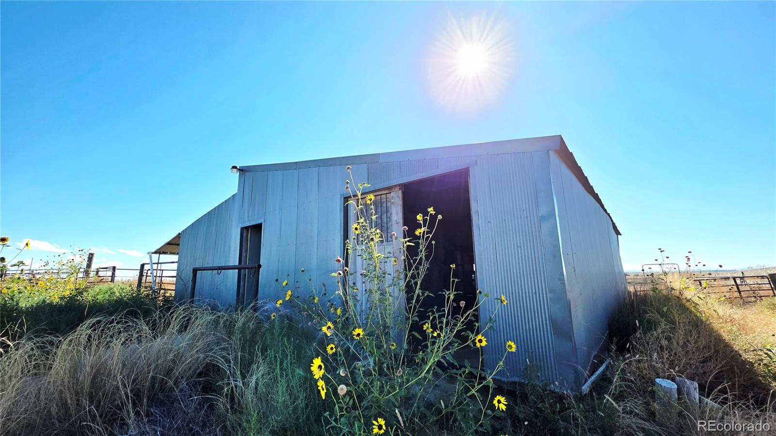 10754 County Road Olney Springs, CO 81062 - Photo 11 of 49 a view of a house with a garden