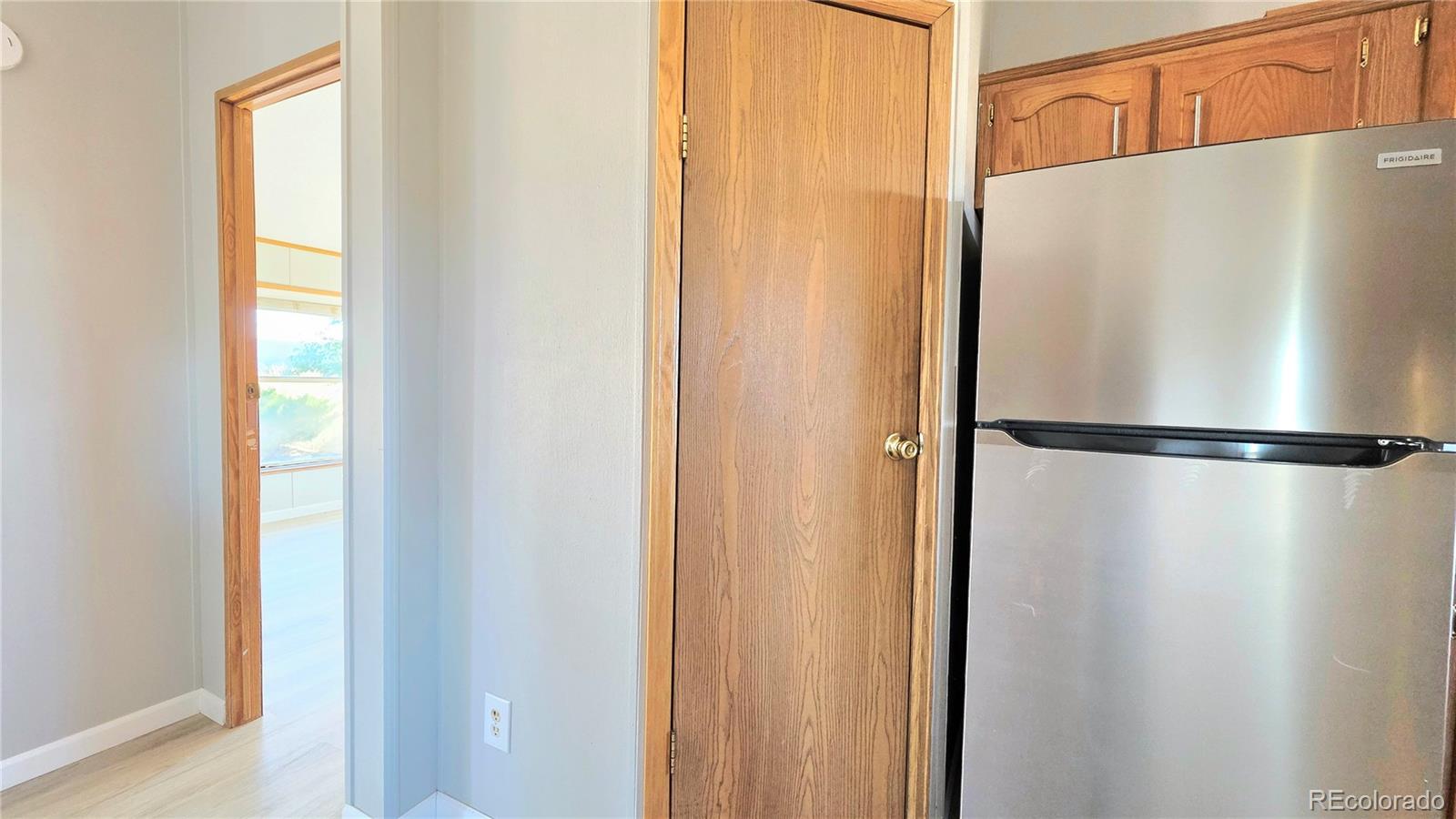10754 County Road Olney Springs, CO 81062 - Photo 16 of 49 a white refrigerator freezer and a dishwasher