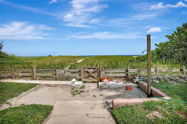a view of a lake with a house