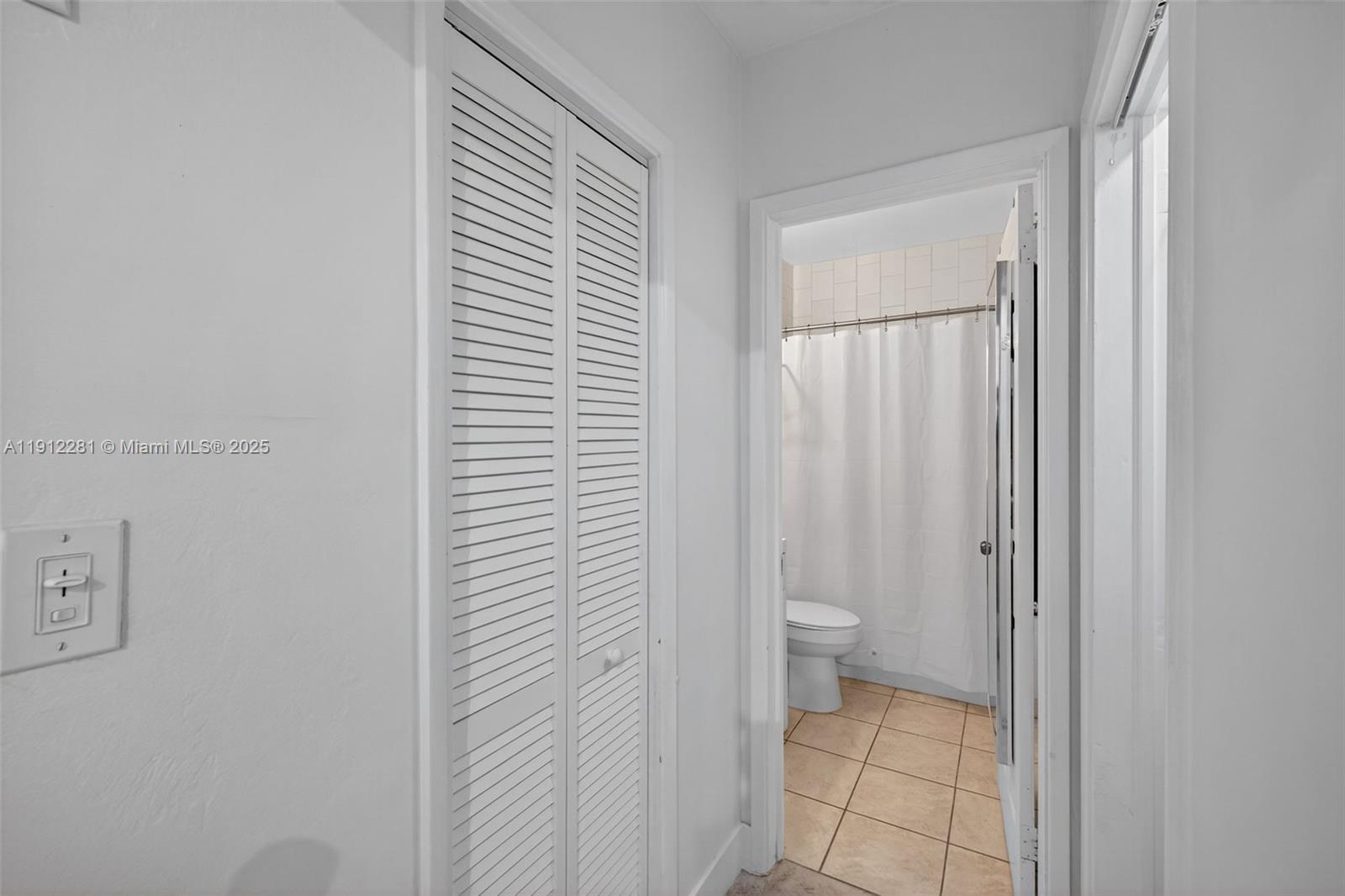 820 North Ocean Boulevard, Unit 1 Pompano Beach, FL 33062 - Photo 10 of 21 a bathroom with a toilet