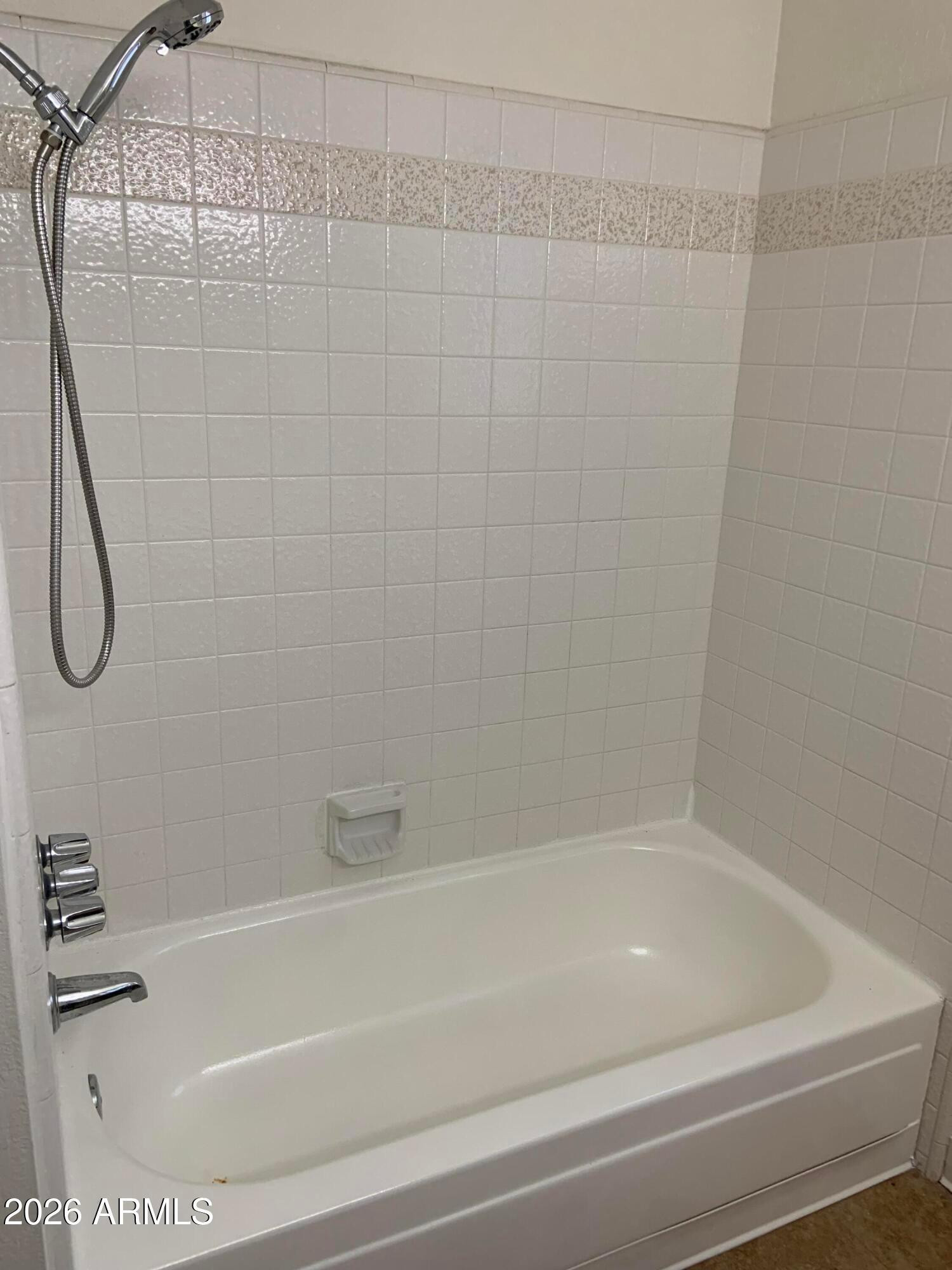 17634 North 2nd Street Phoenix, AZ 85022 - Photo 23 of 29 a bathroom with a shower and a bath tub