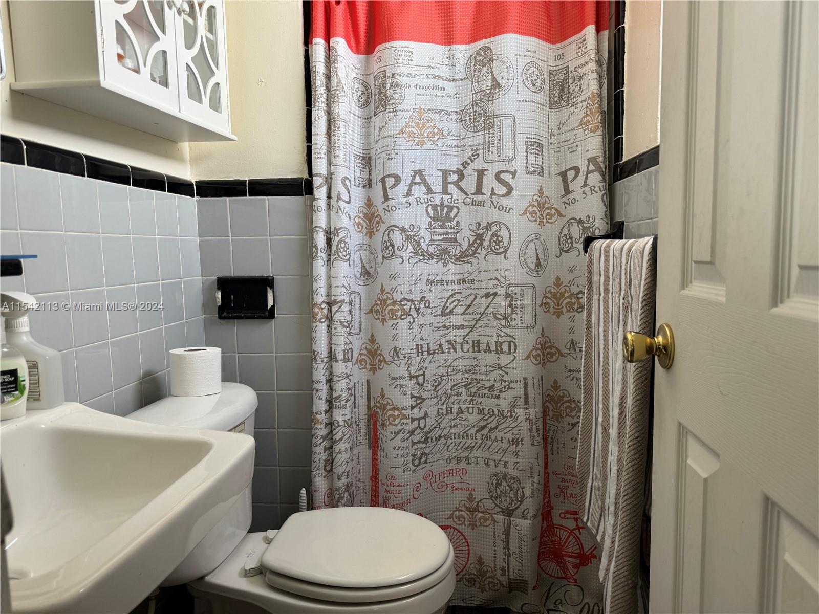 1854 Southwest 17th Street Miami, FL 33145 - Photo 12 of 13 a bathroom with a toilet and a sink