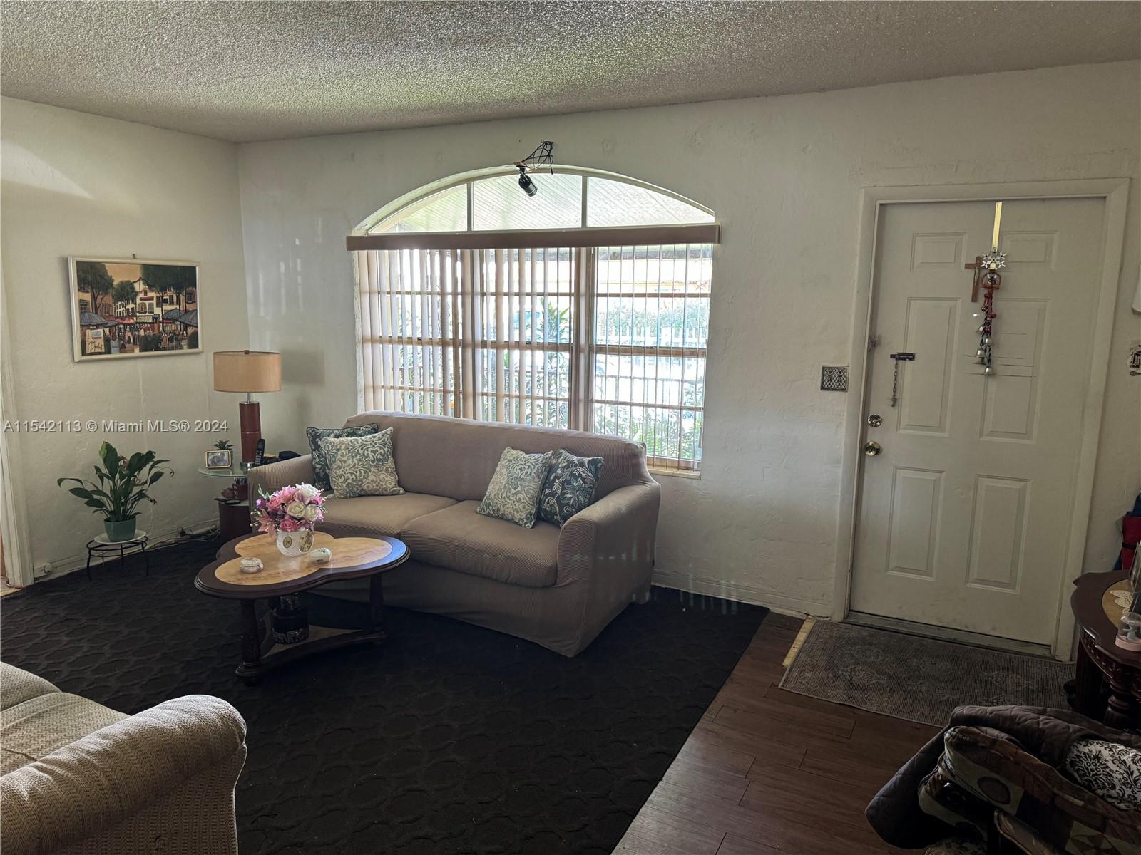 1854 Southwest 17th Street Miami, FL 33145 - Photo 3 of 13 a living room with furniture and a window