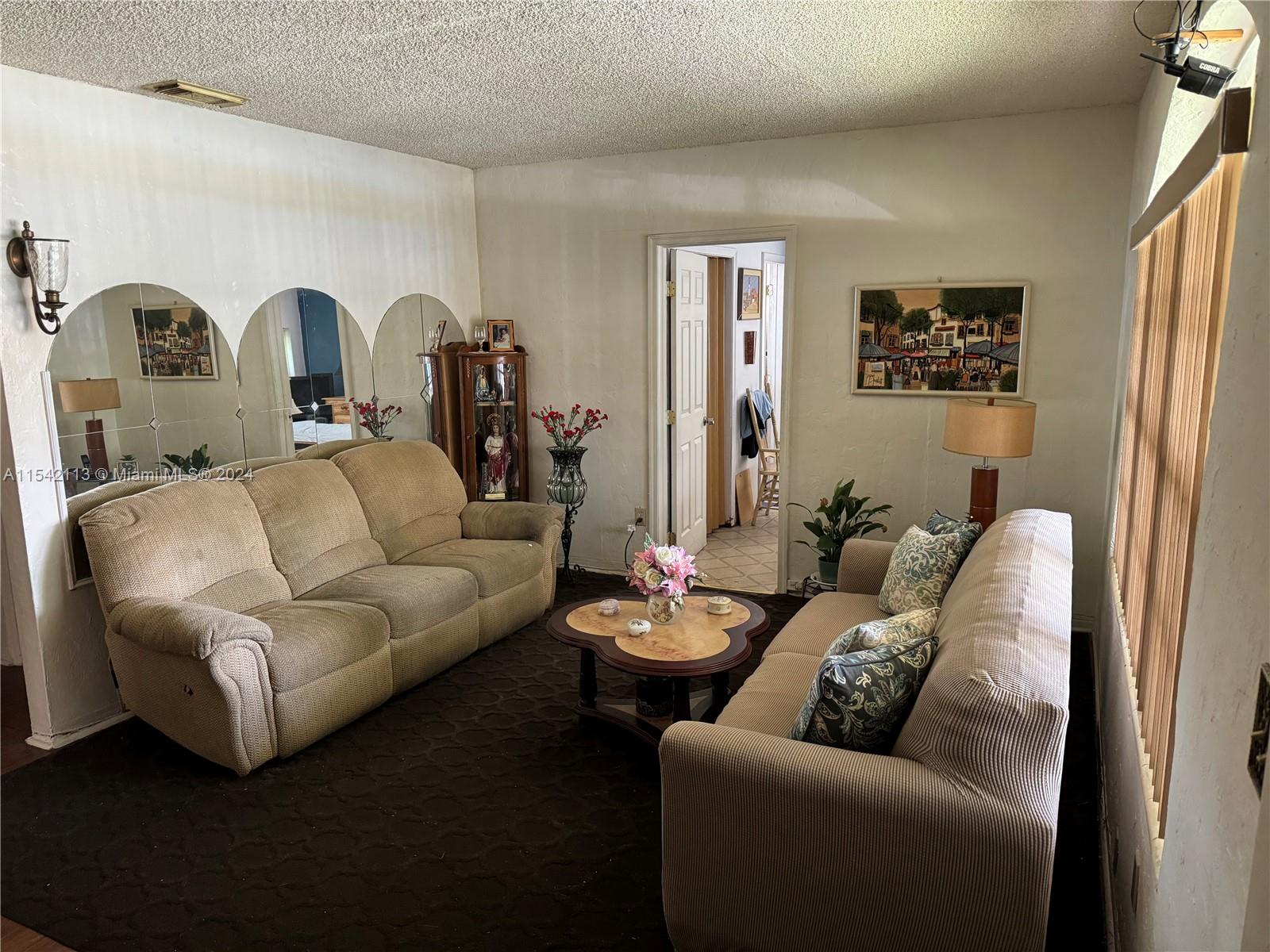 1854 Southwest 17th Street Miami, FL 33145 - Photo 4 of 13 a living room with furniture
