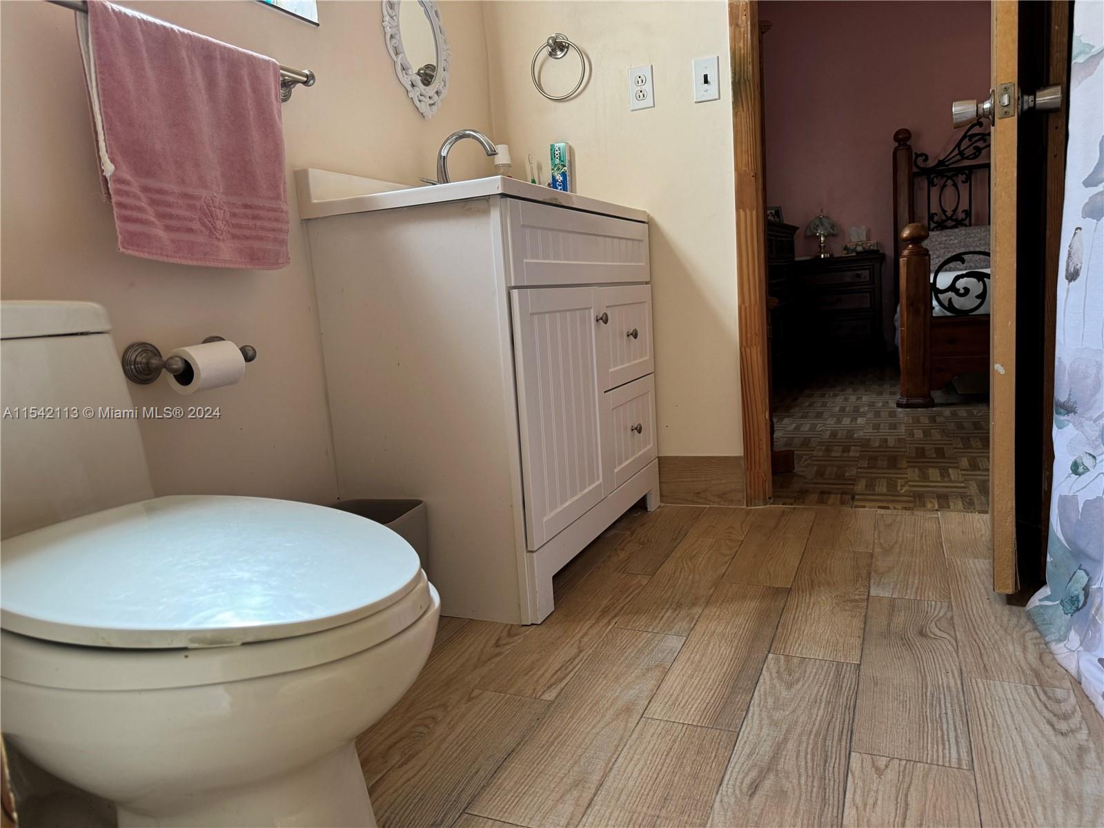 1854 Southwest 17th Street Miami, FL 33145 - Photo 8 of 13 a bathroom with a toilet and a shower