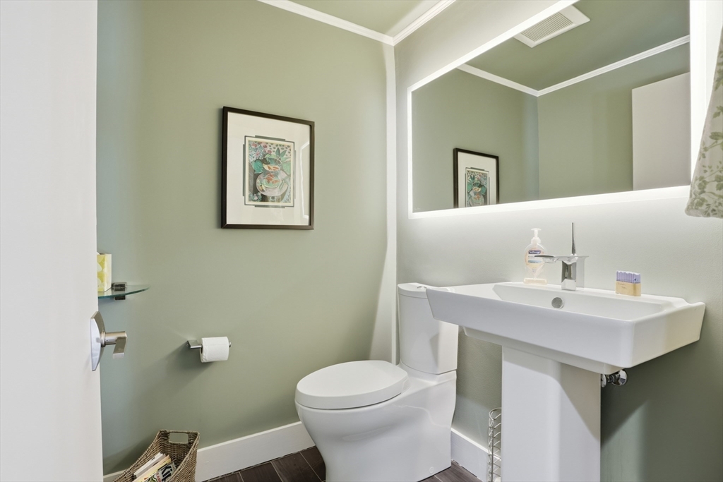 235 Kemp Street Dunstable, MA 01827 - Photo 24 of 42 a bathroom with a sink mirror and toilet