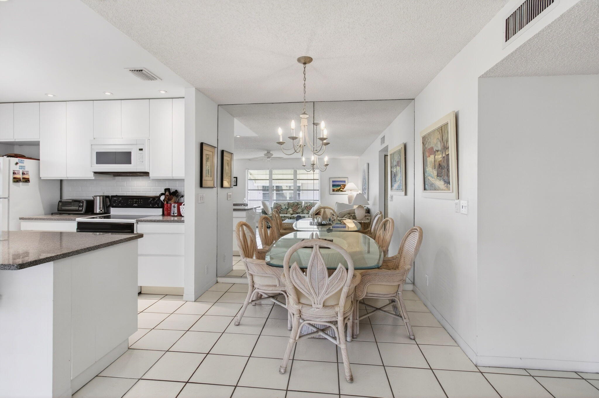 1327 High Point Way Southeast, Unit D Delray Beach, FL 33445 - Photo 24 of 53 Open concept kitchen and dining area vie