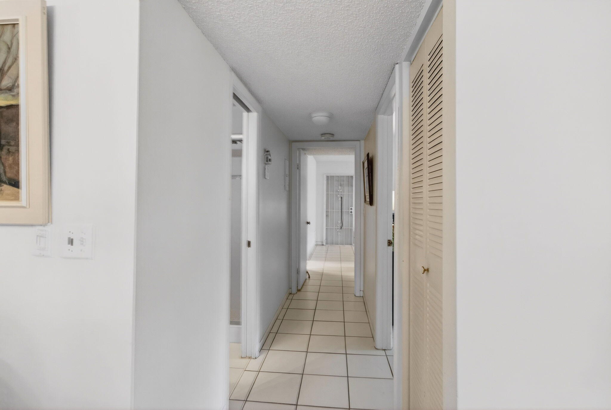 1327 High Point Way Southeast, Unit D Delray Beach, FL 33445 - Photo 25 of 53 a view of a hallway