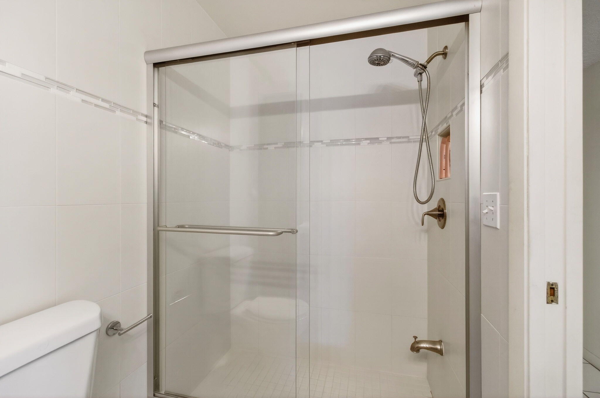 1327 High Point Way Southeast, Unit D Delray Beach, FL 33445 - Photo 28 of 53 a bathroom that has a glass shower door