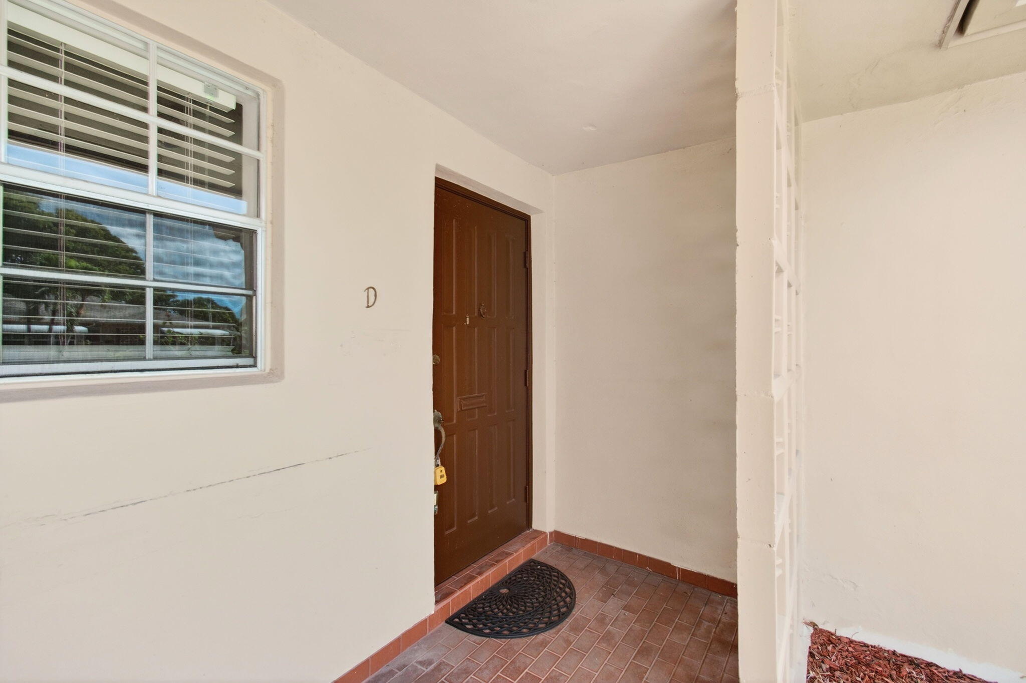 1327 High Point Way Southeast, Unit D Delray Beach, FL 33445 - Photo 4 of 53 a view of an front door