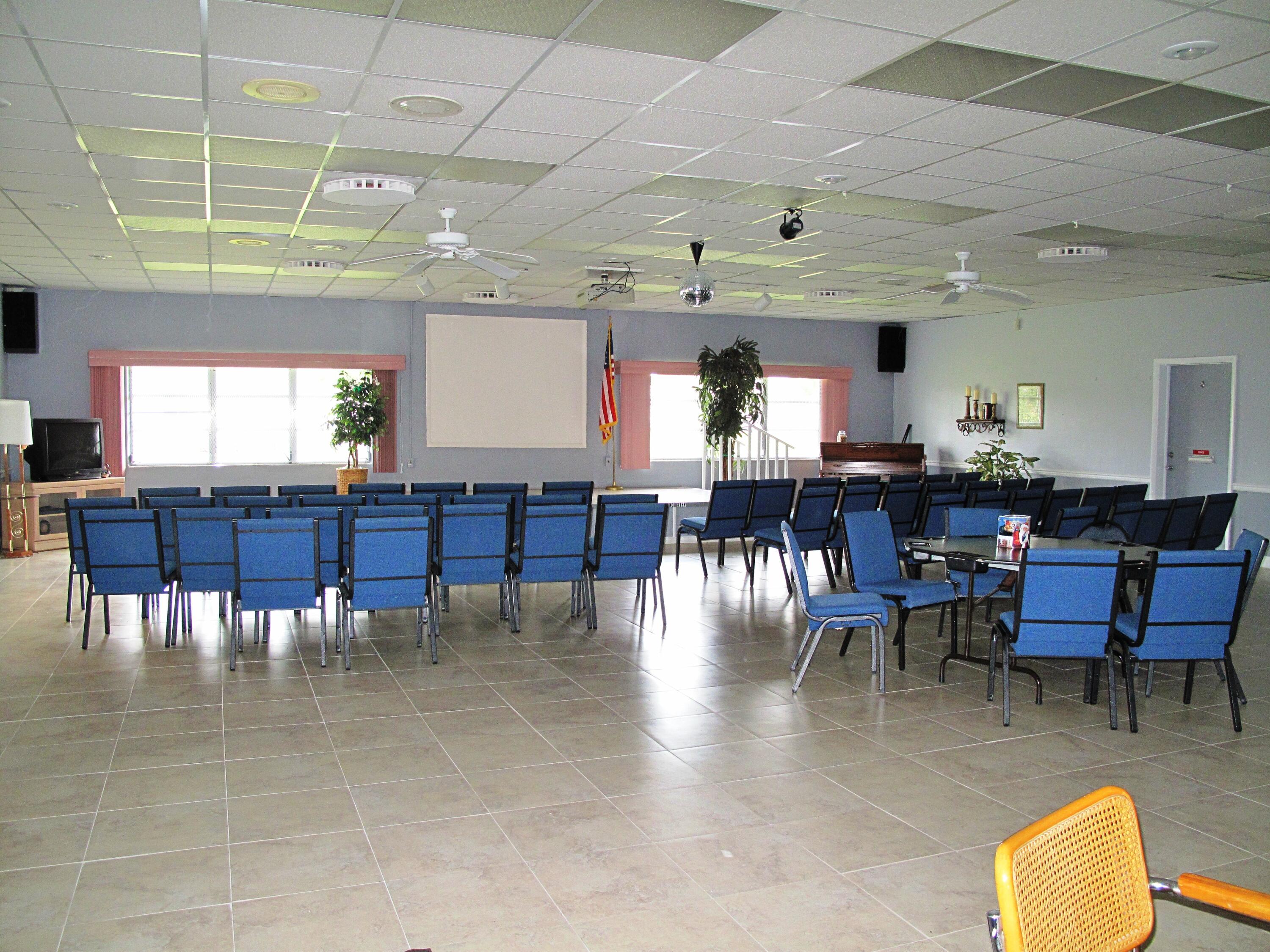 1327 High Point Way Southeast, Unit D Delray Beach, FL 33445 - Photo 47 of 53 a view of a dining room with furniture