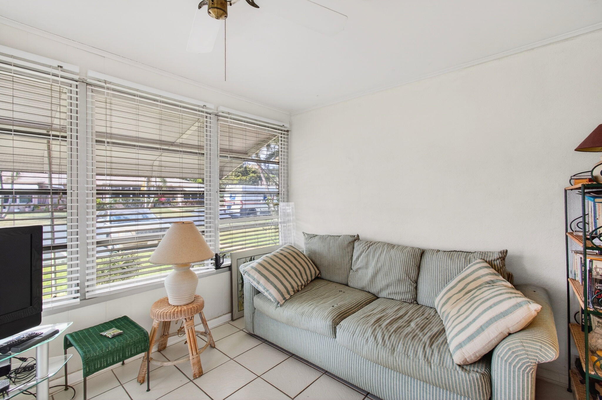 1327 High Point Way Southeast, Unit D Delray Beach, FL 33445 - Photo 7 of 53 a living room with furniture and a window
