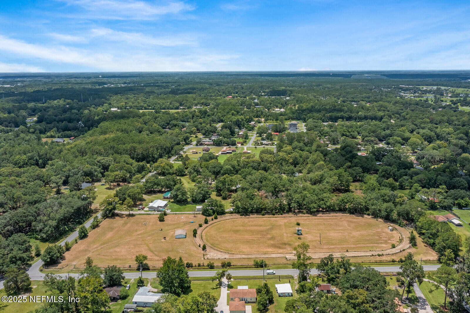 714 Jones Road Jacksonville, FL 32220 - Photo 5 of 12 an aerial view of residential houses with outdoor space