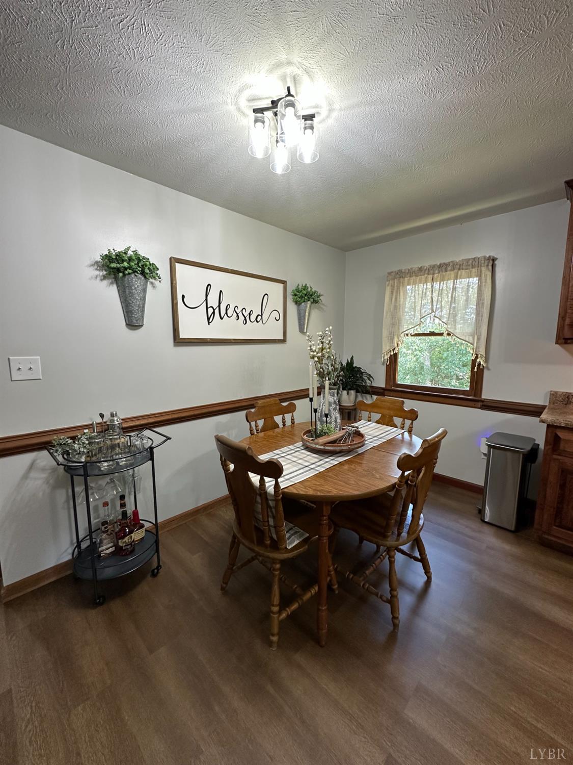 1524 Austin Road Gladstone, VA 24553 - Photo 11 of 30 a view of a dining room with furniture and window