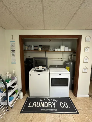 a utility room with dryer and washer