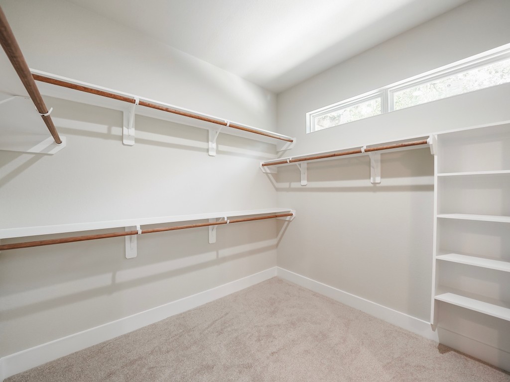 731 Magnolia Point Drive Houston, TX 77336 - Photo 24 of 35 a view of an empty walk in closet