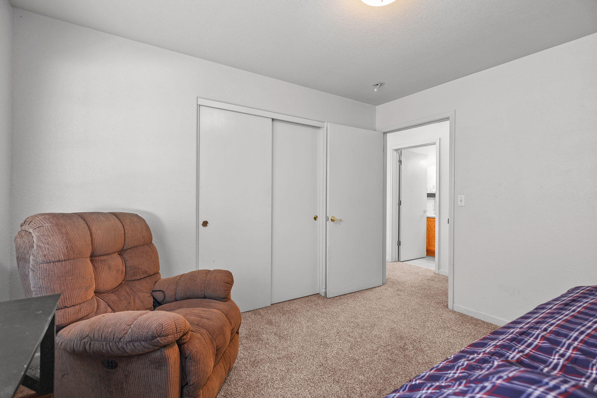 720 Stonebriar Trail Redding, CA 96003 - Photo 14 of 19 a livingroom with furniture and a wooden floor