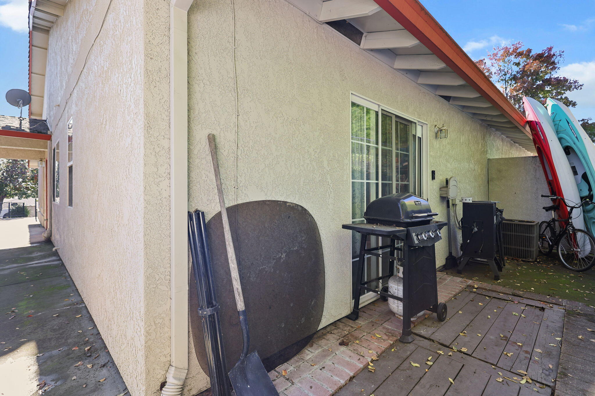 720 Stonebriar Trail Redding, CA 96003 - Photo 18 of 19 a view of a porch with furniture and a potted plant