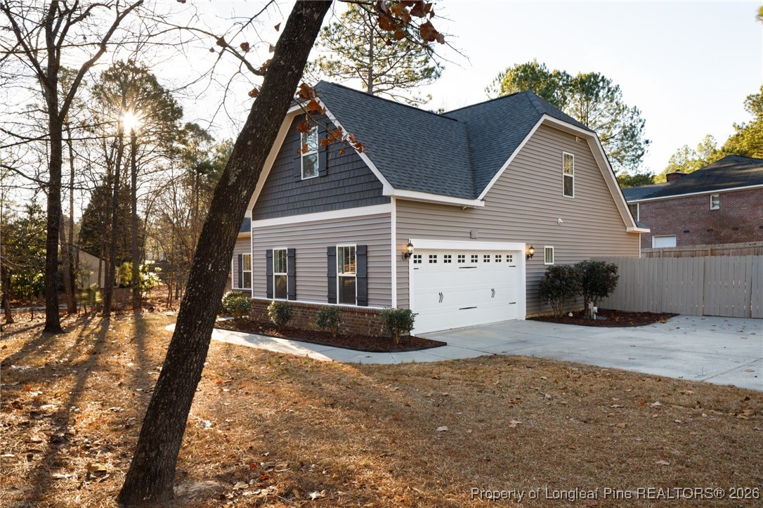 600 Burning Tree Road Pinehurst, NC 28374 - Photo 2 of 31 a view of a house with a yard