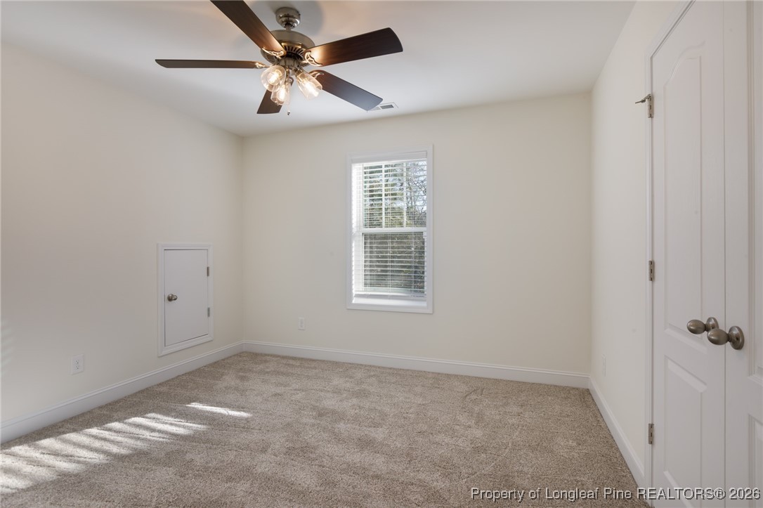 600 Burning Tree Road Pinehurst, NC 28374 - Photo 24 of 31 a view of an empty room with a window