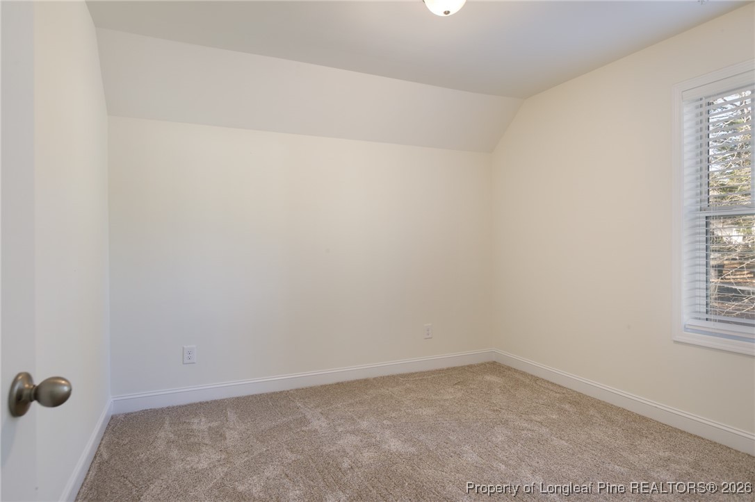 600 Burning Tree Road Pinehurst, NC 28374 - Photo 27 of 31 a room that has a window in it