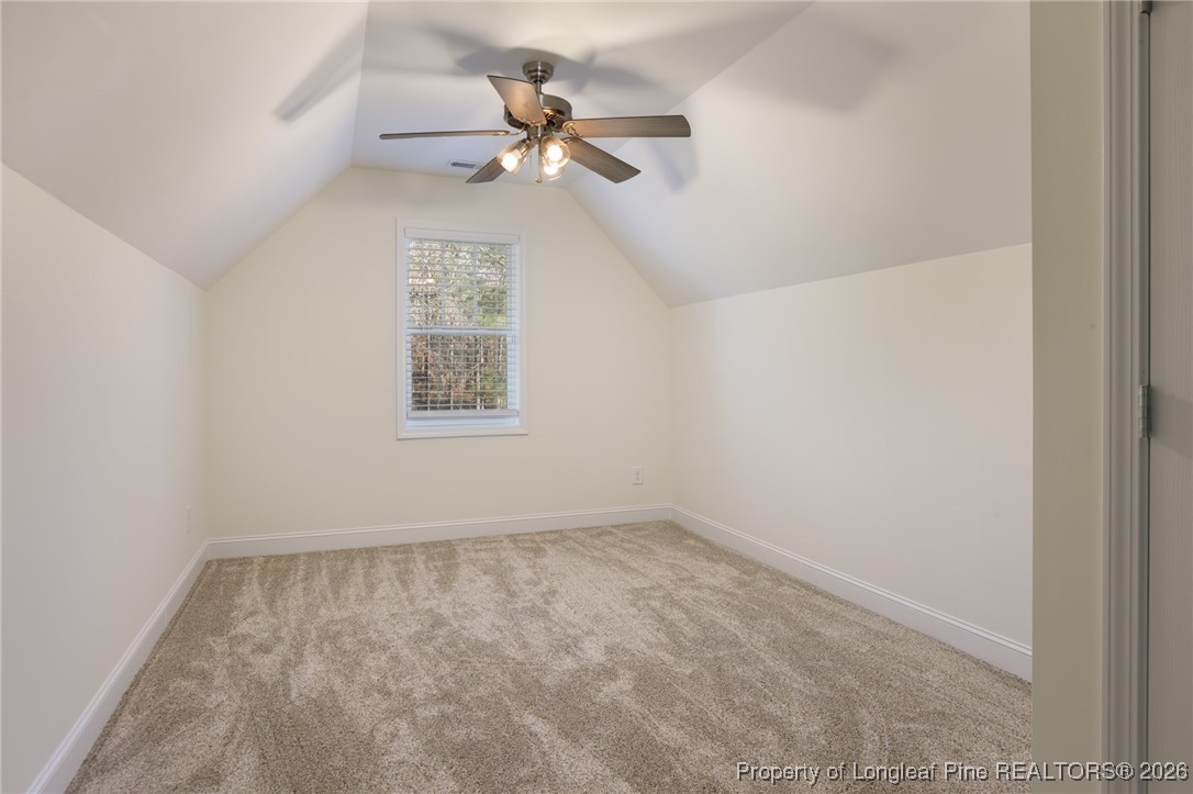 600 Burning Tree Road Pinehurst, NC 28374 - Photo 28 of 31 an empty room with a window and a fan